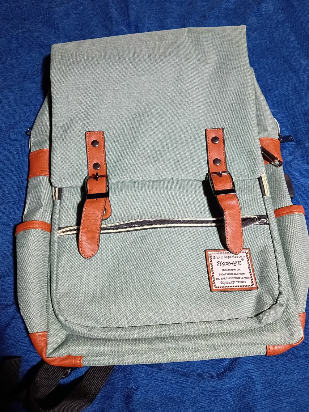 Grace Green Canvas Backpack with Brown Trim And Electronics Port